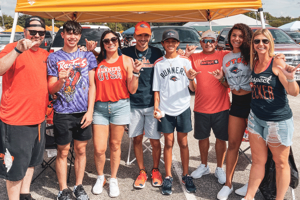 family at tailgate